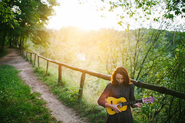istock Girl with ukulele 509722993