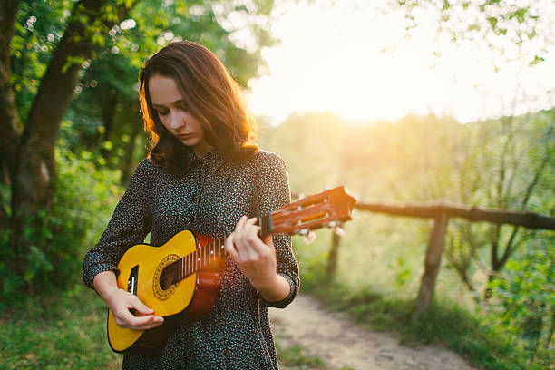 istock Girl with ukulele 509722997