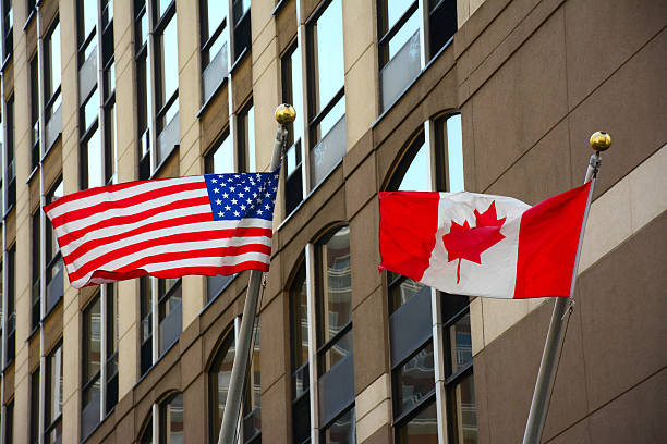istock Canadian and American Flags, Commercial district 509723898