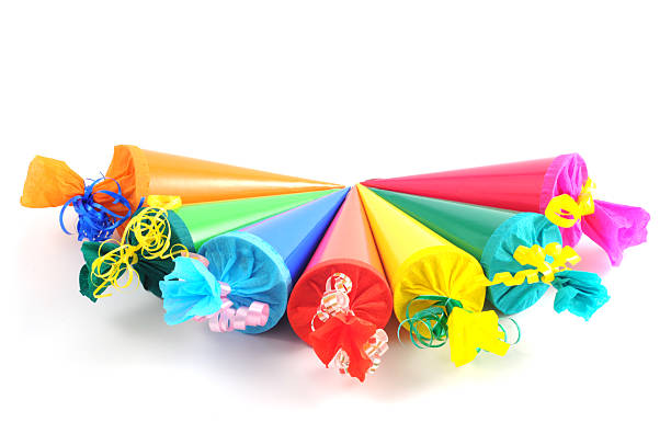 group Conical bags of sweets Conical bag of sweets. in green, red, orange and blue zuckertüte stock pictures, royalty-free photos & images