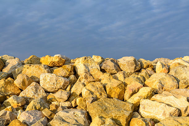 istock Sky and several yellow rocks. Backgroung with clear blue sky 509724898