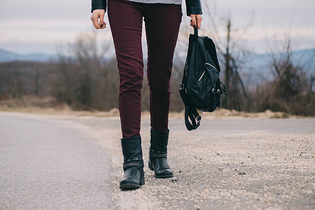 istock Girl walking down the road 509725938