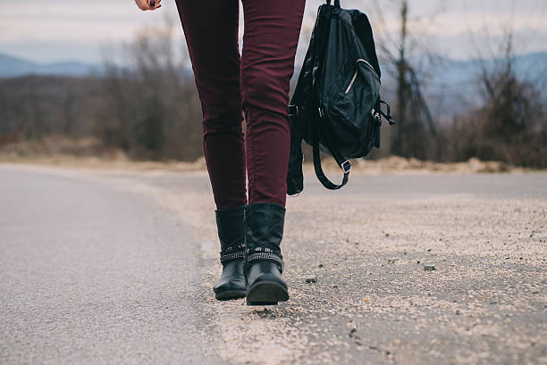 istock Girl walking down the road 509726058