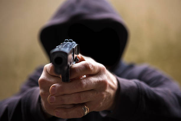 istock Burglar with a gun 509727316