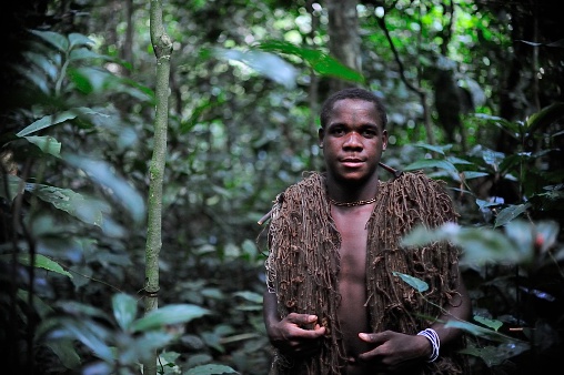 Dzanga-Sangha Forest Reserve, Cental-African Republic, Africa, November, 2, 2008: The hunter-pygmy with a net, before hunting. 