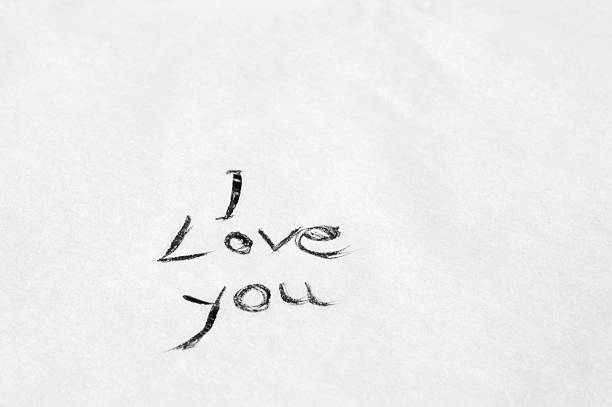 простой " я любовь you" от руки сообщение с черными чернилами - picture of the word love стоковые фото и изображения