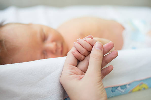 istock little baby boy asleep 509732738