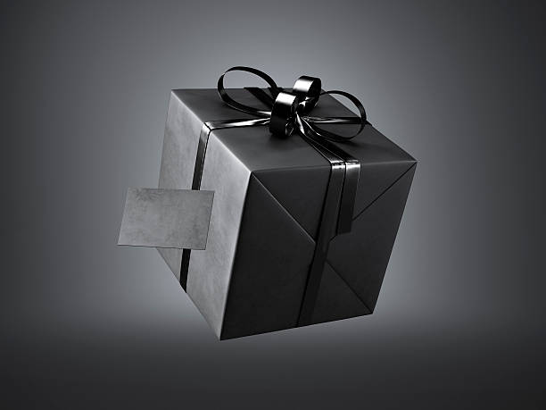 istock Black gift box with black ribbon bow and blank business 509733668