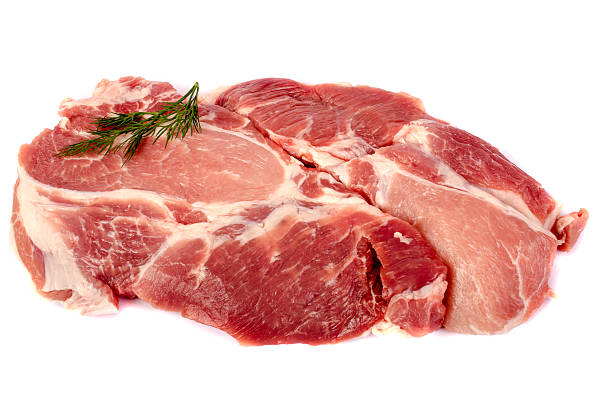 istock Raw pork steak on white background close-up. 509734572