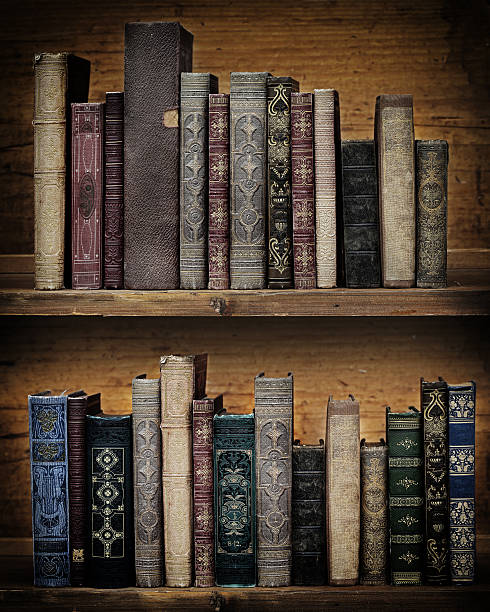 istock vintage books on wooden shelf. 509735708
