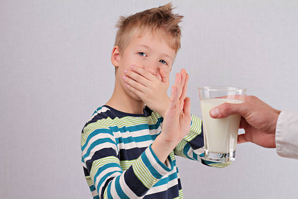 istock Lactose intolerance. Dairy Intolerant child refuses to drink milk 509735780