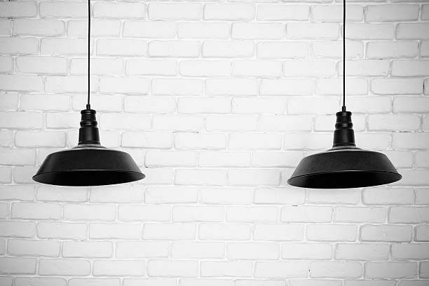 istock Black ceiling lamps vector. Two black ceiling lamps, light betwe 509736116