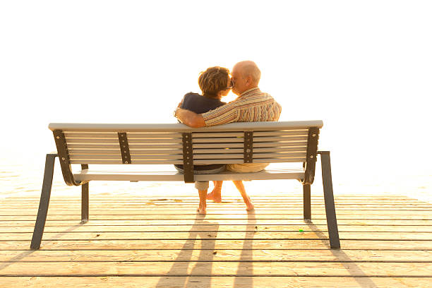 istock couple kissing on jetty 509757469