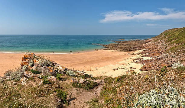 istock Rough rocky coastal panoramic landscape of Brittany with blue sky. 509758435