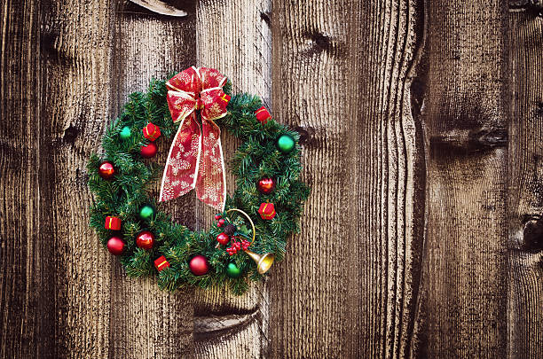 istock Christmas wreath on wooden fence 509783845