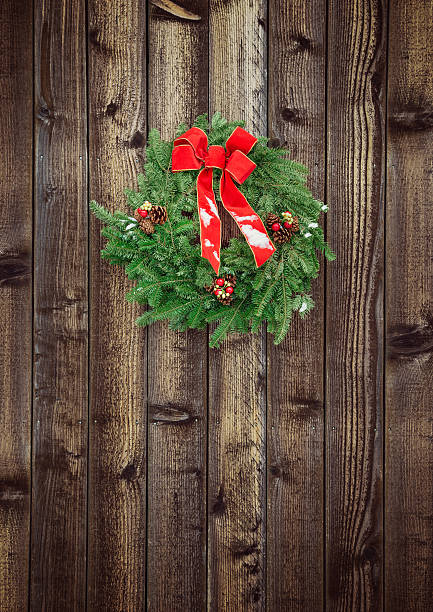 istock Christmas wreath on wooden fence 509783849