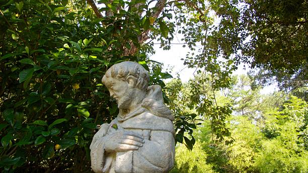 Statue of St. Francis in a garden.