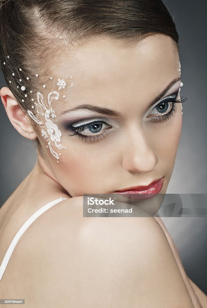 style of bride portrait of beautiful girl bride with coiffure and make up on grey 20-29 Years Stock Photo