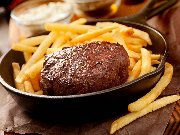 Steak Fillet Seasoned with Sea Salt, Fresh Cracked Pepper and hand Cut Fries -Photographed on Hasselblad H3D2-39mb Camera