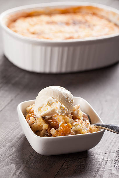 istock Small bowl of freshly served peach crisp 509785980