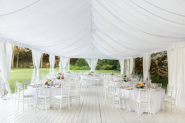 wedding reception outdoor Outdoor wedding reception in tent pavilion photos stock pictures, royalty-free photos & images