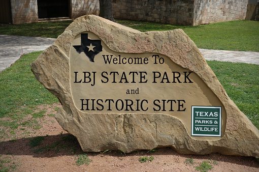Stonewall, TX, USA - April 1, 2015: An entrance to the LBJ State Park and Historic Site. The site is home to the ranch and boyhood home of Lyndon Baines Johnson, the 36th President of the United States.