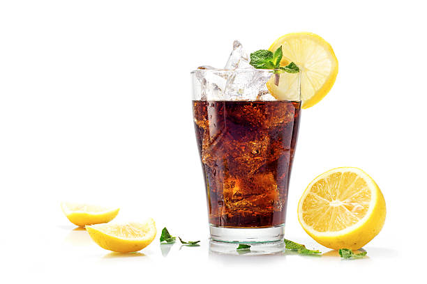 istock glass of cola with ice and lemon isolated on white 509791942