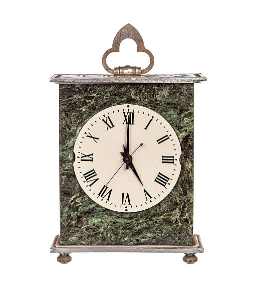 Mantel clock showing Five o'clock stock photo