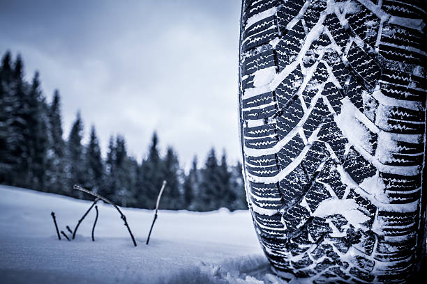 Snow tire in winter stock photo
