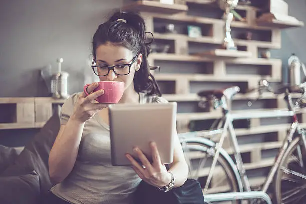 Photo of Working in a café