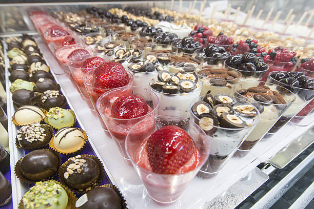 istock mini ice cream with various colors in the glasses 509797302