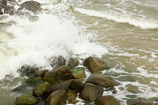 istock stones in a raging sea 509797510