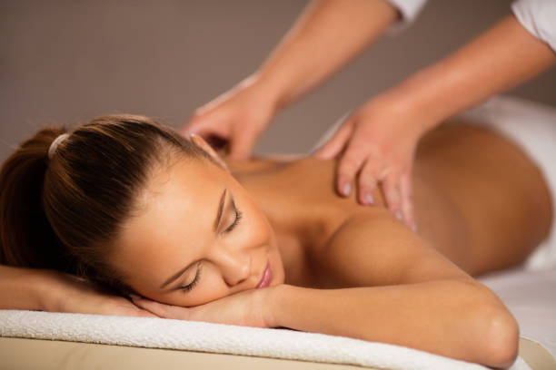 istock Young woman enjoying in massage 509798600