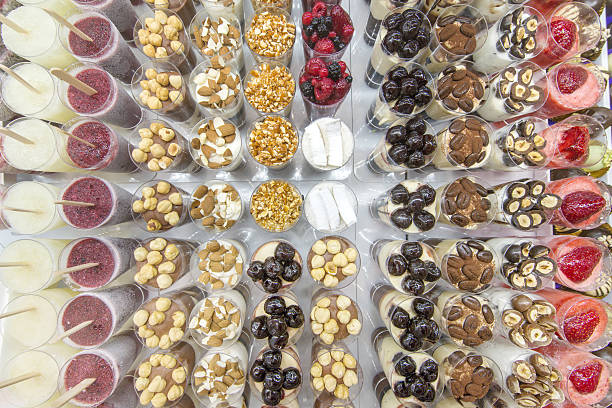 istock mini ice cream with various colors in the glasses 509798872