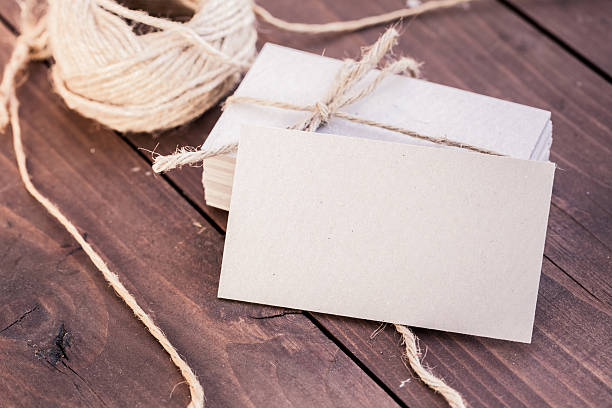 istock Empty Business Cards on Wooden Table 509799464