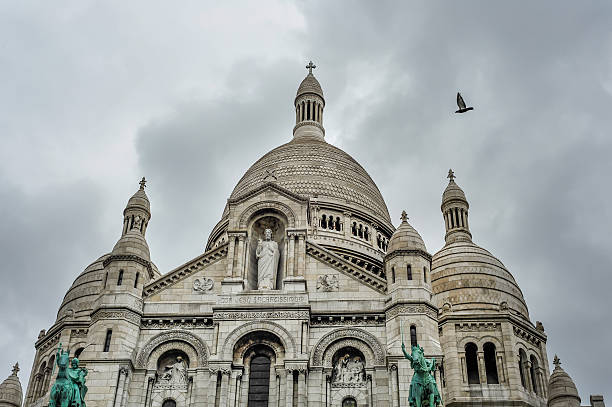 istock Pigeon flies over Sacre Coeur Basilica 509800952