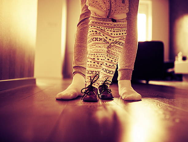 istock Mother and baby legs. First steps. 509801308