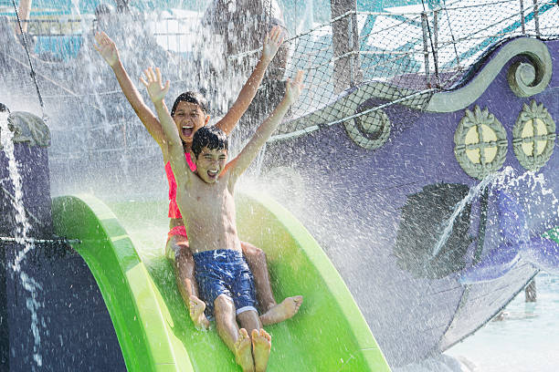 istock Children on water slide 509801343