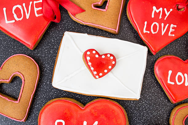 istock Heart cookies with letter on dark background 509805752