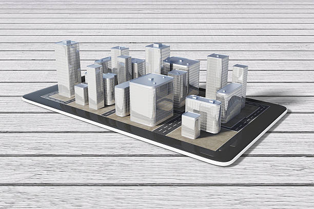 istock 3D city buildings on digital tablet on wooden table 509805990