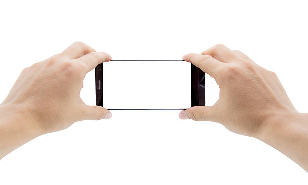 istock Human hand holding blank mobile smart phone 509810526