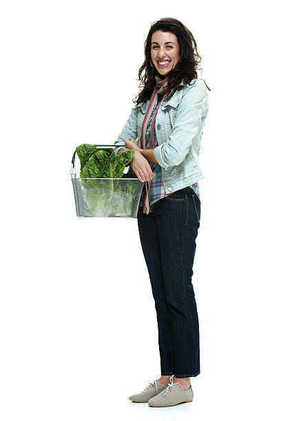 istock Woman carrying vegetables basket 509811712