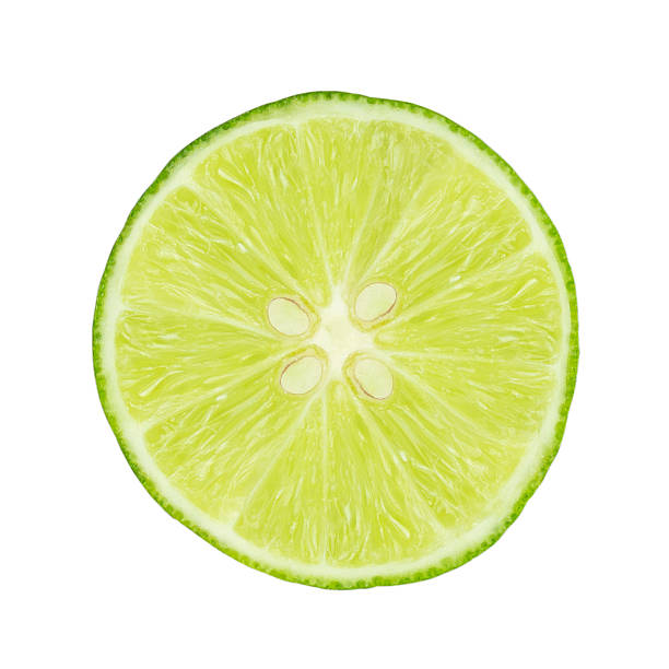 istock lime slice with seeds on white background, isolated 509811784