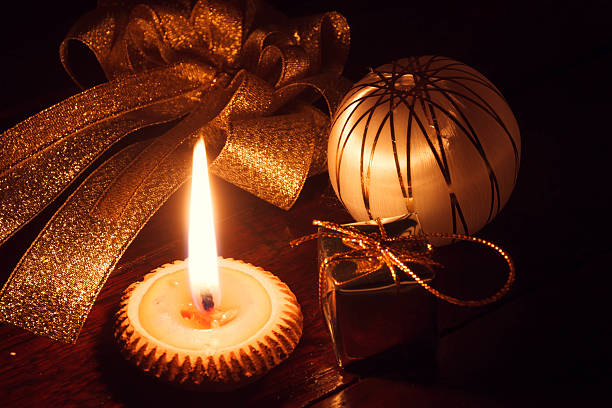 istock selective focus candle light and christmas decoration. 509814676