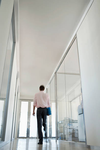 istock Businessman Walking In Corridor 509823269