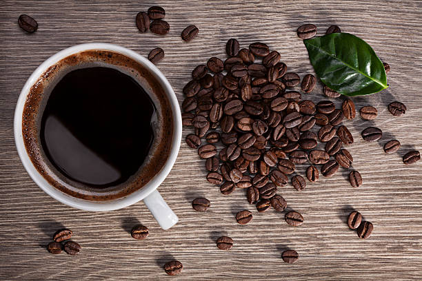 Tasse de café et grains - Photo