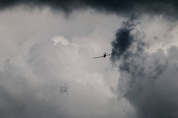 istock Airplane Flying Into Stormy Clouds/Sky 509825455