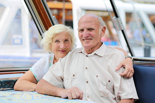 istock Happy senior couple sightseeing in Amsterdam 509826371