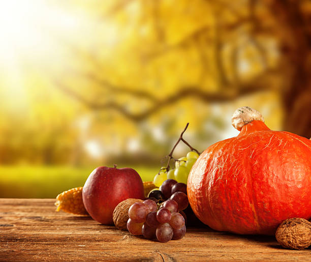 istock Autumn harvested fruit and vegetable on wood 509828829