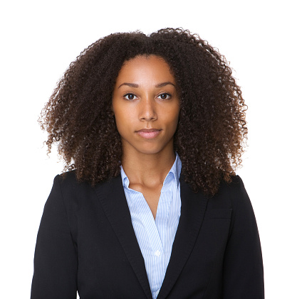 Close up portrait of a black business woman posing on isolated white background